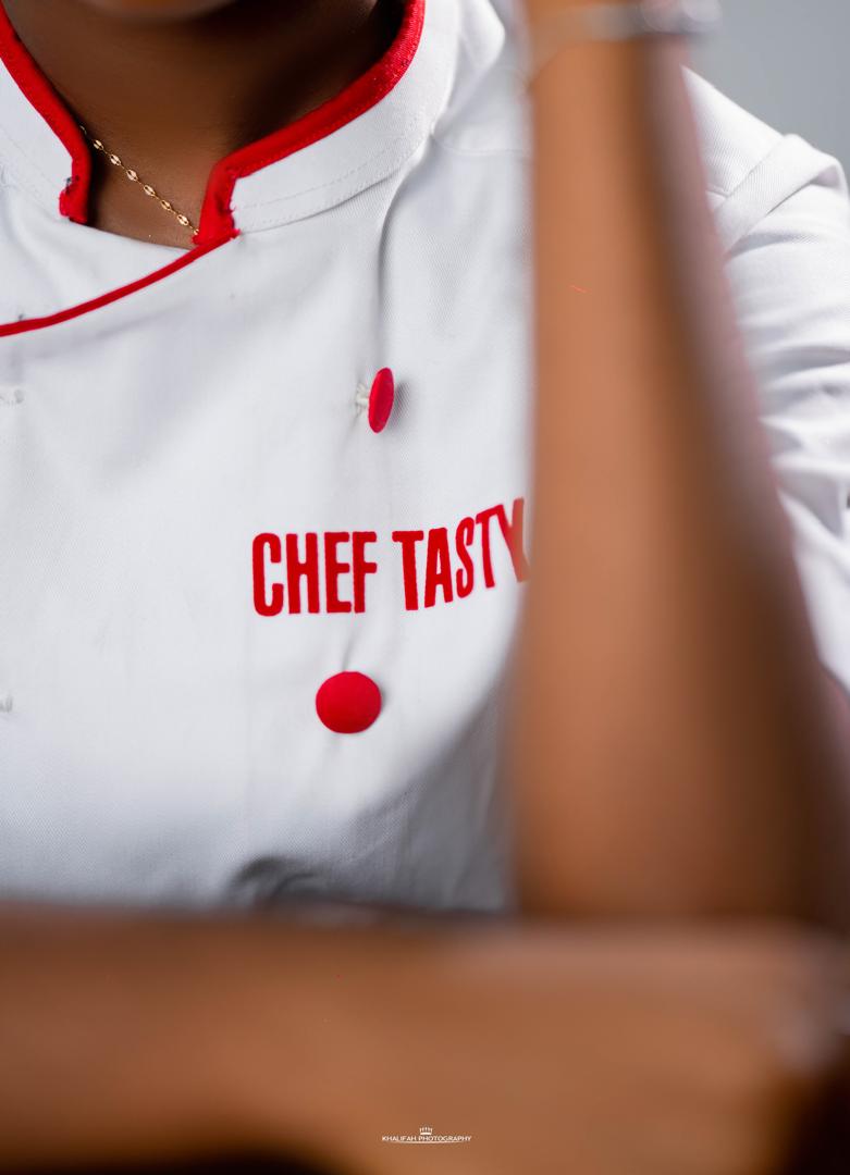 Chef Tasty in her white and red Tasty Treats uniform
